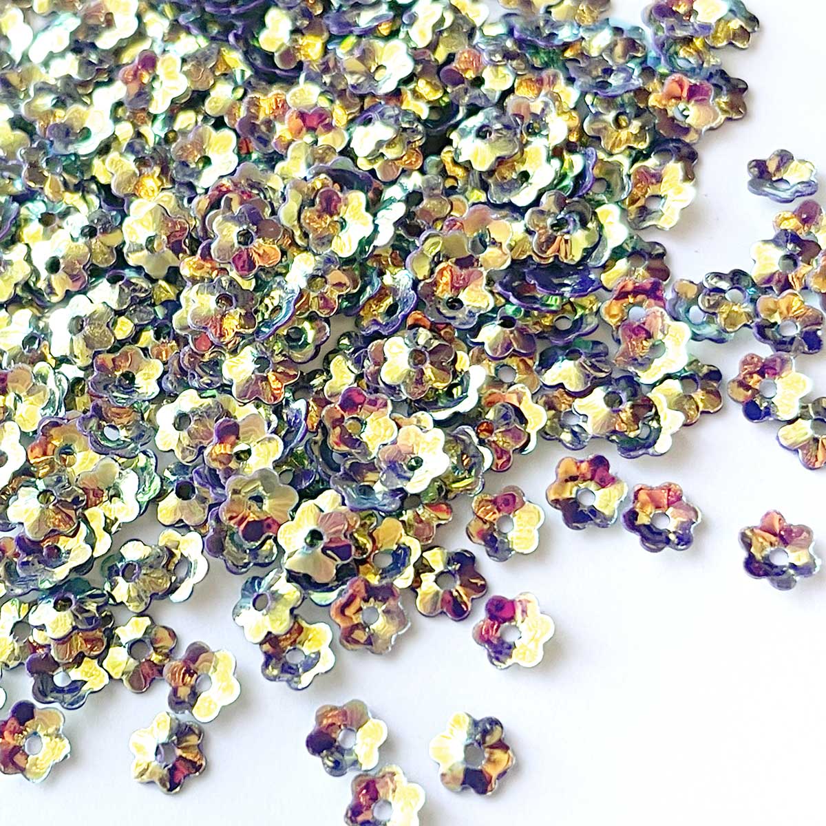 www.colourstreams.com.au Colour Streams Sequins Embellishments Costumes Mardi Gras Dancing Ballet Theatre Shows Drag Queen Bling Australia NZ Canada USA Embroidery Embellishments Stitching Paillettes Couture Millinary Flower Shape Iridescent Reflections Shiny Gold Purple Pink Lights 6mm S166 4mm
