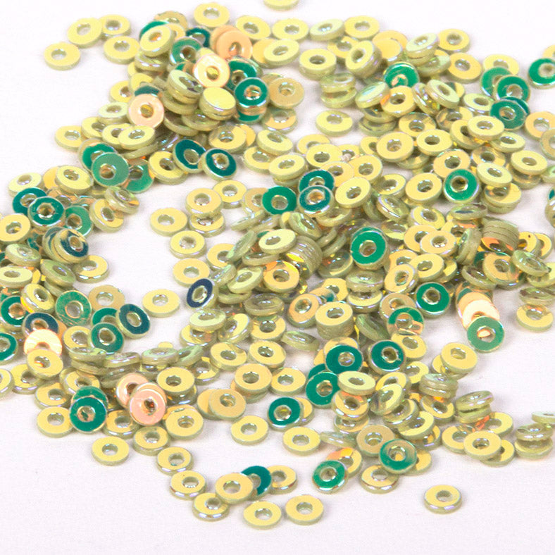  www.colourstreams.com.au Colour Streams Sequins Embellishments Stitching Embroidery Costumes Mardi Gras Dancing Ballet Theatre Shows Drag Queen Bling Luminescent Sequins Flat Circle 3mm Pale Apple Green with Copper Lights S18