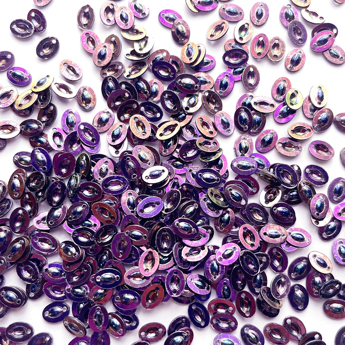 www.colourstreams.com.au Colour Streams Sequins Embellishments Costumes Mardi Gras Dancing Ballet Theatre Shows Drag Queen Bling Australia USA Canada NZ Shape Reflective Sequin Oval 2 Holes 5mm x 4mm Purple Blue Copper Lights S247