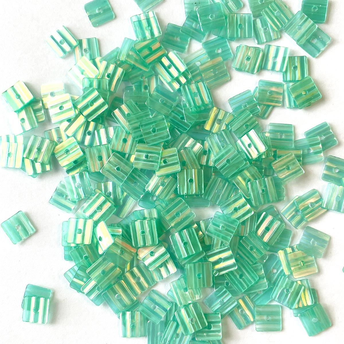  www.colourstreams.com.au Colour Streams Sequins Embellishments Stitching Embroidery Costumes Mardi Gras Dancing Ballet Theatre Shows Drag Queen Bling Costuming Embellishments USA Australia America NZ Canada Iridescent Luminous Textured Sequins Square 6mm Aqua S268