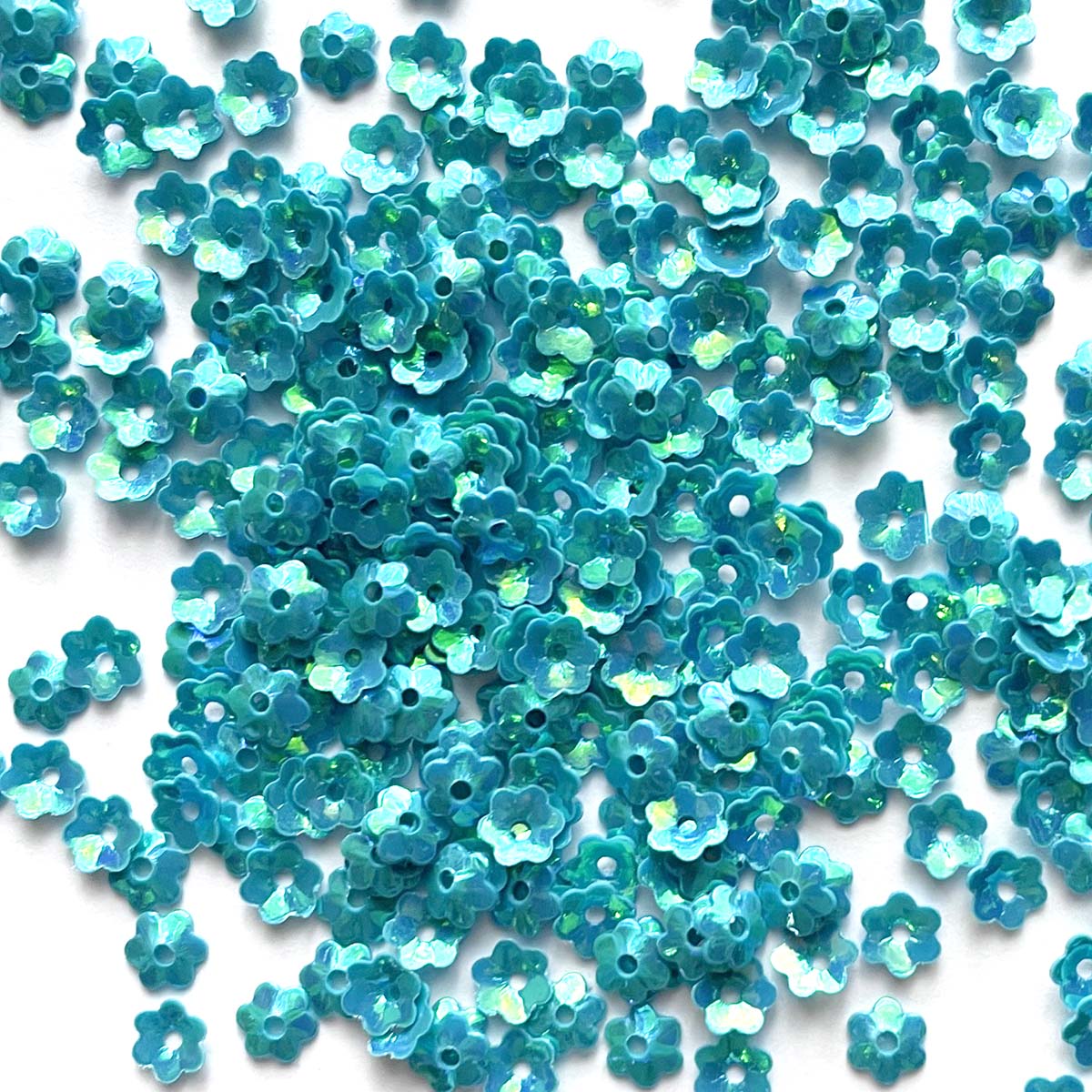 www.colourstreams.com.au Colour Streams Sequins Embellishments Costumes Mardi Gras Dancing Ballet Theatre Shows Drag Queen Bling Australia USA NZ Canada Costuming Stitching Embroidery Opaque Flower Shape Iridescent Reflections Bright Blue with Green Lights 5mm S295