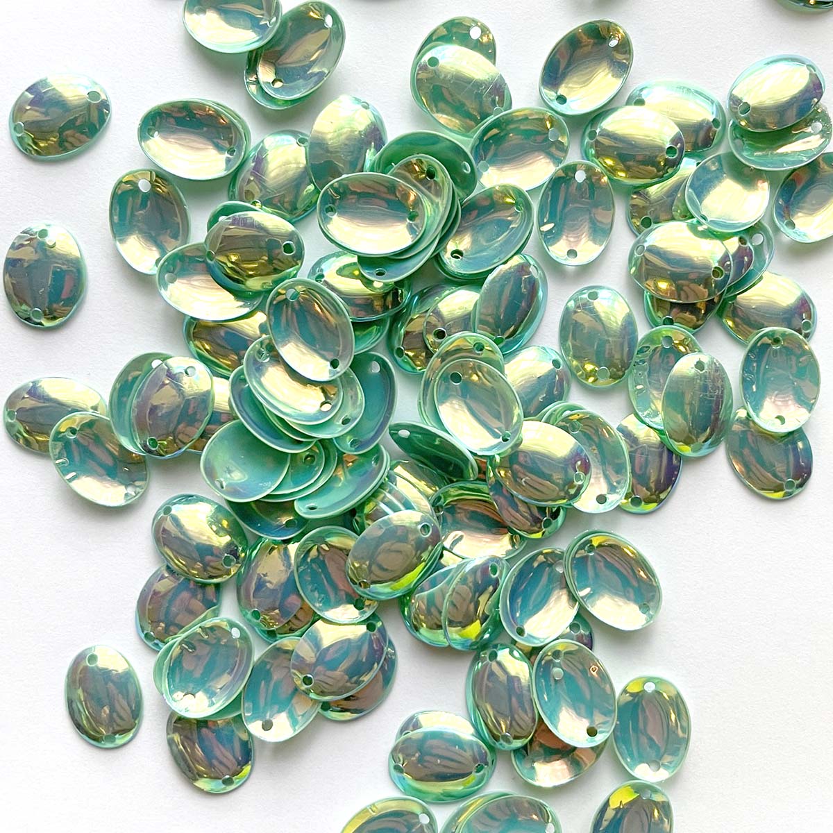 www.colourstreams.com.au Colour Streams Sequins Embellishing Costuming Jewellry Embroidery Stitching Mardi Gras Dancing Ballet Theatre Shows Drag Queen Bling Cup Circle Shape Reflective Iridescent Shiny Australia NZ Canada Aqua Green with Gold and Copper Lights 11mm x 8mm mm S296