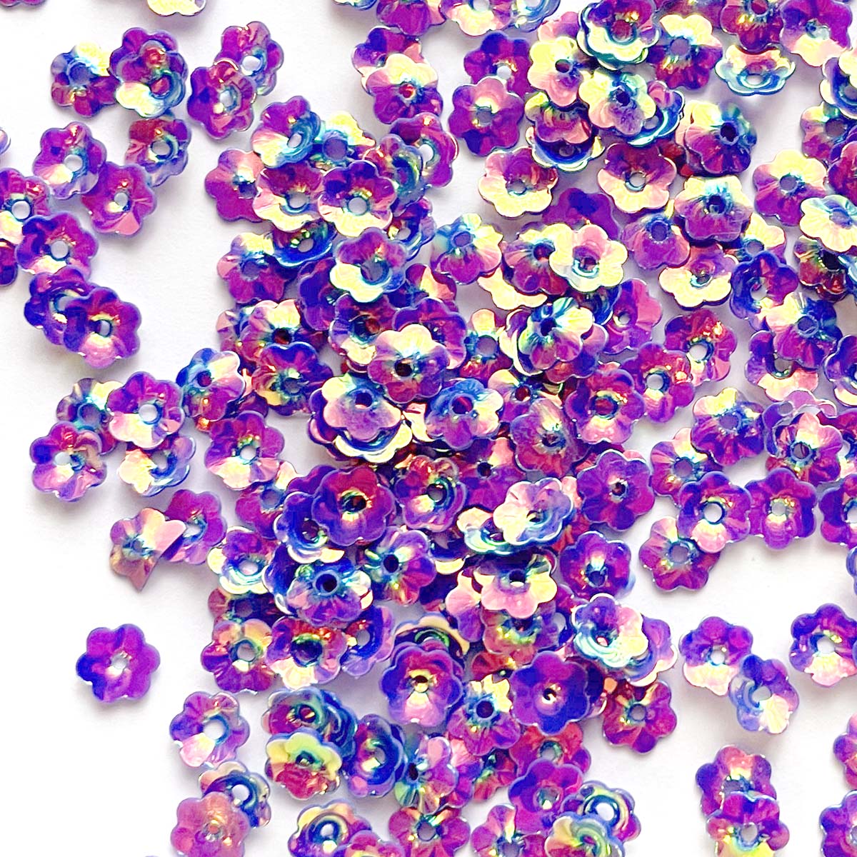 www.colourstreams.com.au Colour Streams Sequins Embellishments Costumes Mardi Gras Dancing Ballet Theatre Shows Drag Queen Bling Australia USA NZ Canada Costuming Stitching Embroidery Opaque Flower Shape Iridescent Reflections Pink with Purple, Gold and Green Green Lights 6mm S297